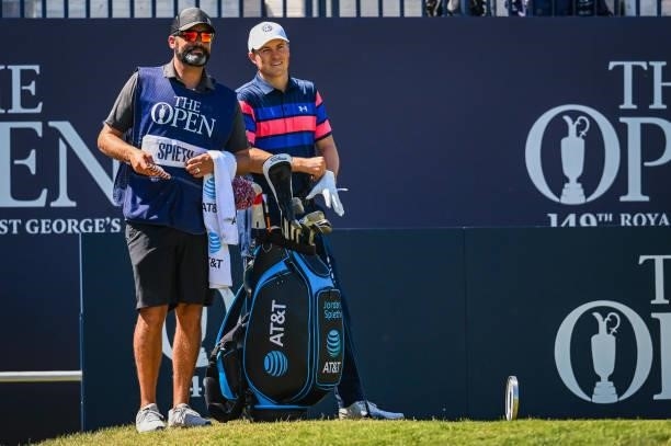 Jordan Spieth smiles on the first tee with his caddie Michael Greller during Day Four of the 149th The Open Championship at Royal St. Georges Golf...