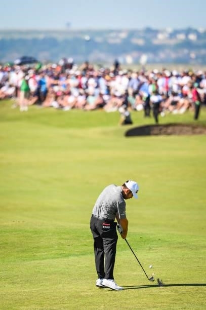 Louis Oosthuizen of South Africa at impact as he hits his second shot on the seventh hole fairway during Day Four of the 149th The Open Championship...