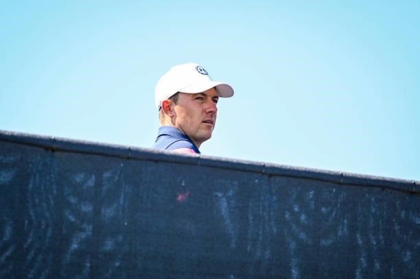 Jordan Spieth looks down the first hole fairway as he crosses a bridge from the practice green to the first tee during Day Four of the 149th The Open...