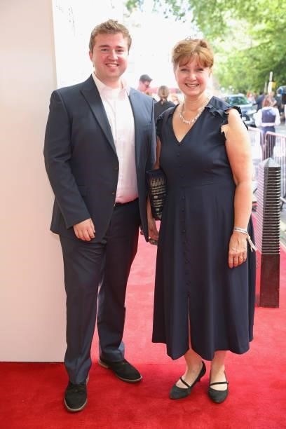 Alex Woolf and guest arrive at the South Bank Sky Arts awards at The Savoy Hotel on July 19, 2021 in London, England. The South Bank Sky Arts Awards...