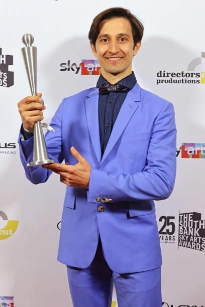 Valentino Zucchetti, accepting the Dance Award, poses in the winners room at the South Bank Sky Arts awards at The Savoy Hotel on July 19, 2021 in...
