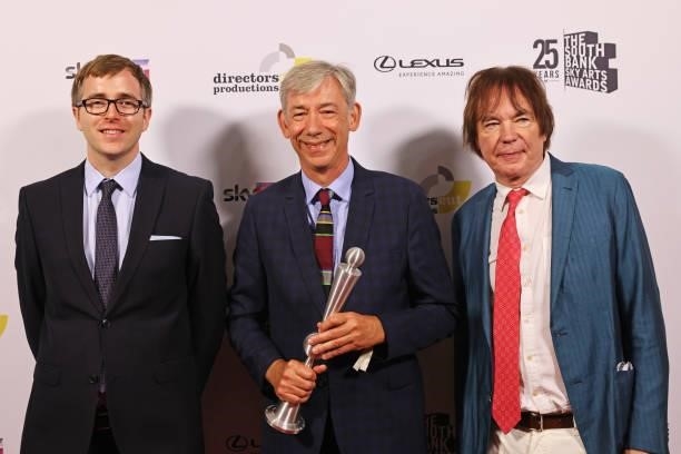 Scott Lumsdaine and Michael Eakin, accepting the Classical Music Award for Petrenko's Mahler I & II, and presenter Julian Lloyd Webber pose in the...