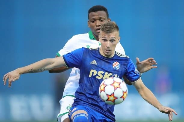 Mislav Orsic of Dinamo Zagreb and Abdullahi Shehu of Omonoia in action during the UEFA Champions League Second Qualifying Round match between GNK...
