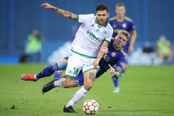 Michal Duris of Omonoia and Kristijan Jakic of Dinamo Zagreb in action during the UEFA Champions League Second Qualifying Round match between GNK...