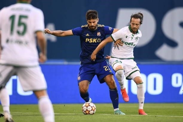 Mikkel Diskerud of Omonoia and Bruno Petkovic of Dinamo Zagreb battle for the ball during the UEFA Champions League Second Qualifying Round match...