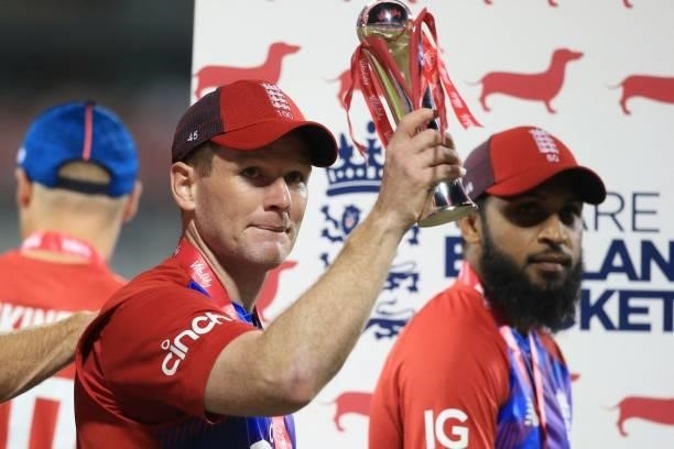 England's Captain Eoin Morgan raises the winner's trophy following the third T20 international cricket match between England and Pakistan at Old...