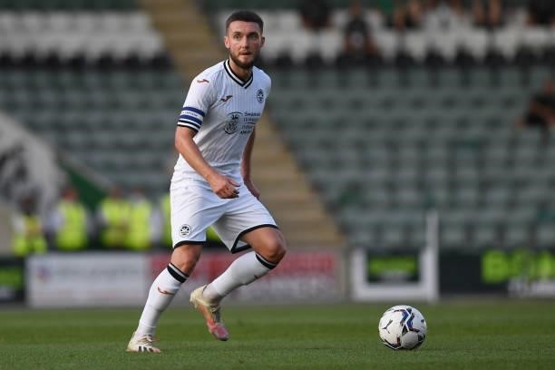 Matt Grimes of Swansea City in action during the Pre season friendly match between Plymouth Argyle and Swansea City at Home Park on July 20, 2021 in...