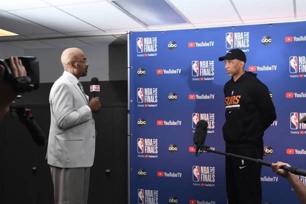 Analyst Dennis Scott interviews Head Coach Monty Williams of the Phoenix Suns before the game against the Milwaukee Bucks during Game Six of the 2021...