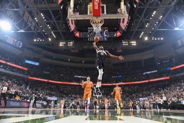 Khris Middleton of the Milwaukee Bucks dunks the ball during the game against the Phoenix Suns during Game Six of the 2021 NBA Finals on July 20,...