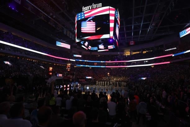 The Phoenix Suns and the Milwaukee Bucks stand for the national anthem during Game Six of the 2021 NBA Finals on July 20, 2021 at the Fiserv Forum in...