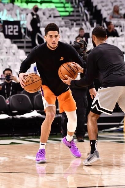 Devin Booker of the Phoenix Suns warms up before the game against the Milwaukee Bucks during Game Six of the 2021 NBA Finals on July 20, 2021 at the...