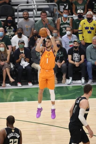 Devin Booker of the Phoenix Suns shoots the ball against the Milwaukee Bucks during Game Six of the 2021 NBA Finals on July 20, 2021 at Fiserv Forum...