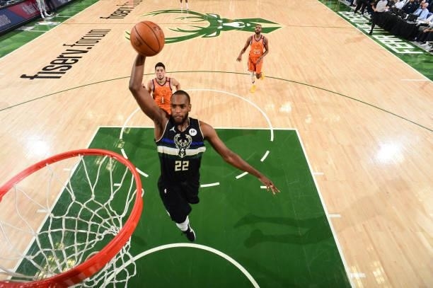 Khris Middleton of the Milwaukee Bucks dunks the ball during the game against the Phoenix Suns during Game Six of the 2021 NBA Finals on July 20,...