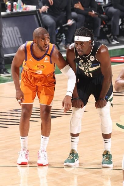 Chris Paul of the Phoenix Suns and Jrue Holiday of the Milwaukee Bucks fight for position during Game Six of the 2021 NBA Finals on July 20, 2021 at...
