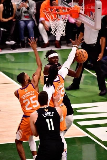 Jrue Holiday of the Milwaukee Bucks looks to pass the ball against the Phoenix Suns during Game Six of the 2021 NBA Finals on July 20, 2021 at the...