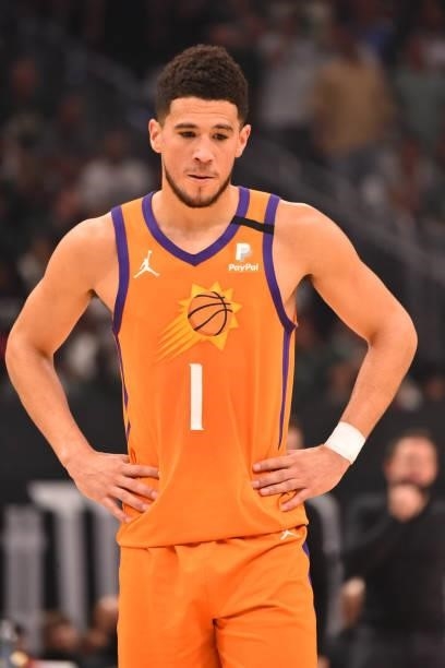 Devin Booker of the Phoenix Suns looks on during Game Six of the 2021 NBA Finals on July 20, 2021 at Fiserv Forum in Milwaukee, Wisconsin. NOTE TO...