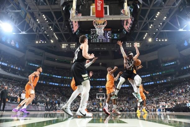 Jrue Holiday of the Milwaukee Bucks looks to pass the ball during the game against the Phoenix Suns during Game Six of the 2021 NBA Finals on July...