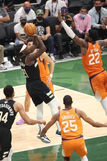 Jrue Holiday of the Milwaukee Bucks shoots the ball against the Phoenix Suns during Game Six of the 2021 NBA Finals on July 20, 2021 at Fiserv Forum...