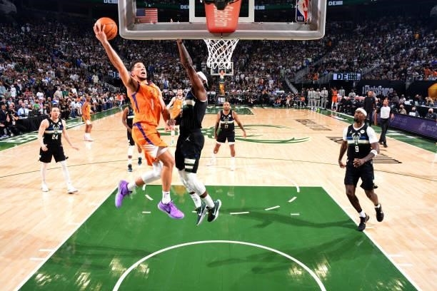 Devin Booker of the Phoenix Suns shoots the ball against the Milwaukee Bucks during Game Six of the 2021 NBA Finals on July 20, 2021 at Fiserv Forum...
