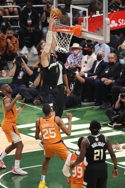 Brook Lopez of the Milwaukee Bucks dunks the ball against the Phoenix Suns during Game Six of the 2021 NBA Finals on July 20, 2021 at Fiserv Forum in...