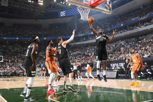 Khris Middleton of the Milwaukee Bucks rebounds the ball during the game against the Phoenix Suns during Game Six of the 2021 NBA Finals on July 20,...