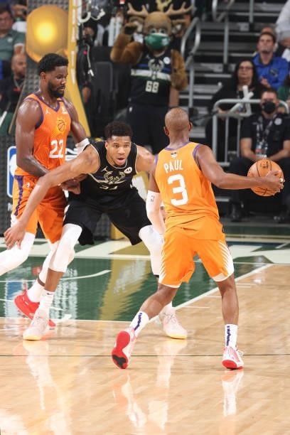 Giannis Antetokounmpo of the Milwaukee Bucks plays defense on Chris Paul of the Phoenix Suns during Game Six of the 2021 NBA Finals on July 20, 2021...