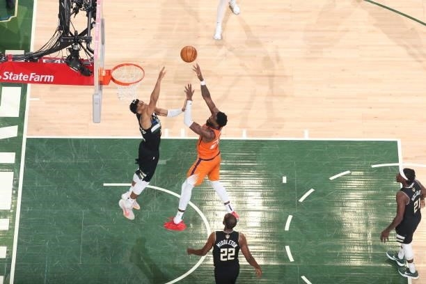 Giannis Antetokounmpo of the Milwaukee Bucks blocks the ball against the Phoenix Suns during Game Six of the 2021 NBA Finals on July 20, 2021 at the...