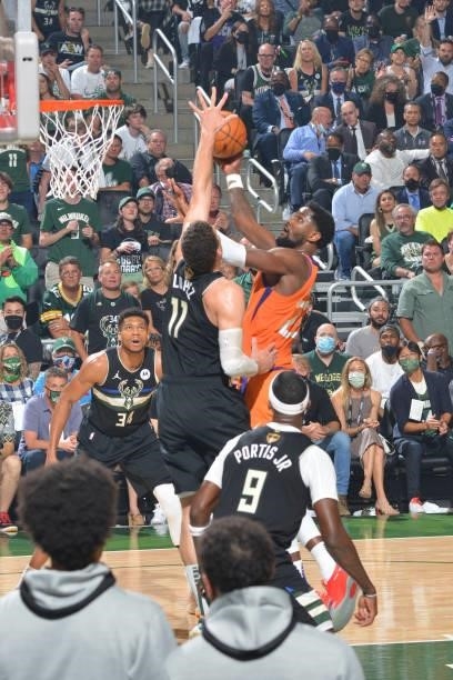 Deandre Ayton of the Phoenix Suns shoots the ball against the Milwaukee Bucks during Game Six of the 2021 NBA Finals on July 20, 2021 at Fiserv Forum...