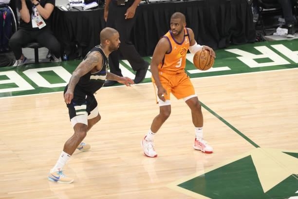 Chris Paul of the Phoenix Suns handles the ball against the Milwaukee Bucks during Game Six of the 2021 NBA Finals on July 20, 2021 at Fiserv Forum...