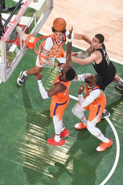 Deandre Ayton of the Phoenix Suns rebounds the ball during the game against the Milwaukee Bucks during Game Six of the 2021 NBA Finals on July 20,...