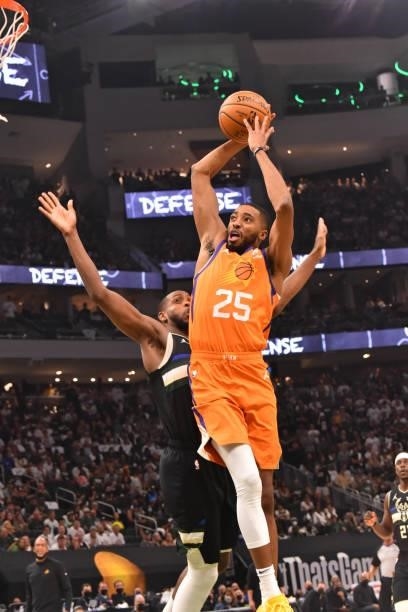 Mikal Bridges of the Phoenix Suns dunks the ball against the Milwaukee Bucks during Game Six of the 2021 NBA Finals on July 20, 2021 at Fiserv Forum...