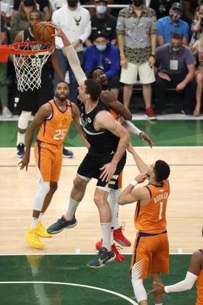 Brook Lopez of the Milwaukee Bucks dunks the ball against the Phoenix Suns during Game Six of the 2021 NBA Finals on July 20, 2021 at Fiserv Forum in...
