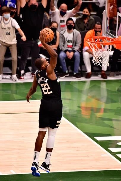Khris Middleton of the Milwaukee Bucks dunks the ball against the Phoenix Suns during Game Six of the 2021 NBA Finals on July 20, 2021 at the Fiserv...
