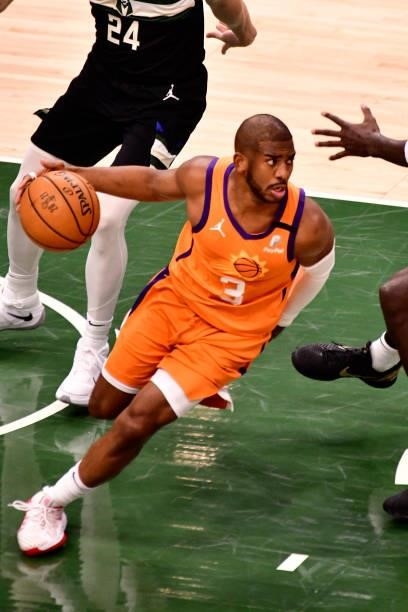 Chris Paul of the Phoenix Suns handles the ball against the Milwaukee Bucks during Game Six of the 2021 NBA Finals on July 20, 2021 at the Fiserv...