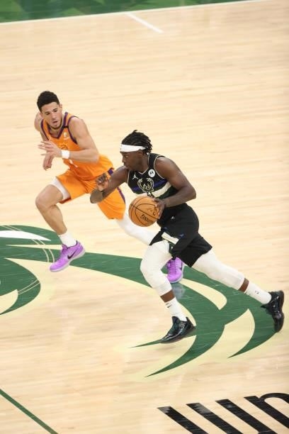 Jrue Holiday of the Milwaukee Bucks drives to the basket against the Phoenix Suns during Game Six of the 2021 NBA Finals on July 20, 2021 at Fiserv...
