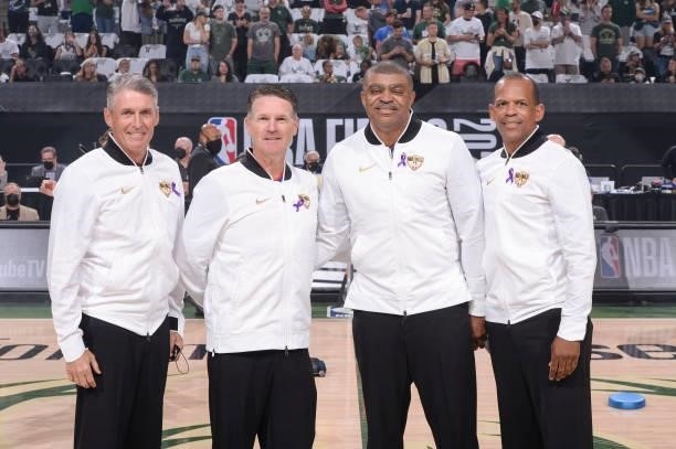Referee Scott Foster, referee Pat Fraher, referee Tony Brothers and referee Eric Lewis pose for a photo before the game between the Phoenix Suns and...