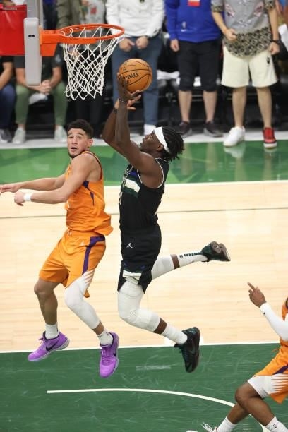 Jrue Holiday of the Milwaukee Bucks shoots the ball against the Phoenix Suns during Game Six of the 2021 NBA Finals on July 20, 2021 at Fiserv Forum...