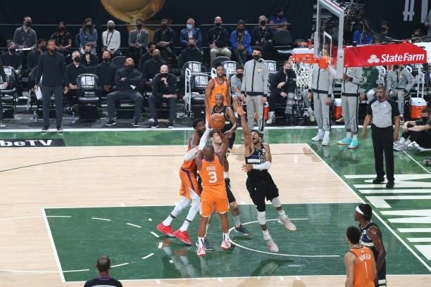Giannis Antetokounmpo of the Milwaukee Bucks plays defense on Chris Paul of the Phoenix Suns during Game Six of the 2021 NBA Finals on July 20, 2021...