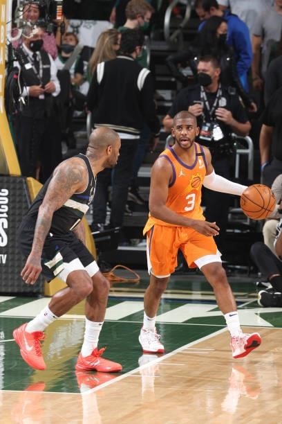 Chris Paul of the Phoenix Suns dribbles the ball during Game Six of the 2021 NBA Finals on July 20, 2021 at the Fiserv Forum in Milwaukee, Wisconsin....