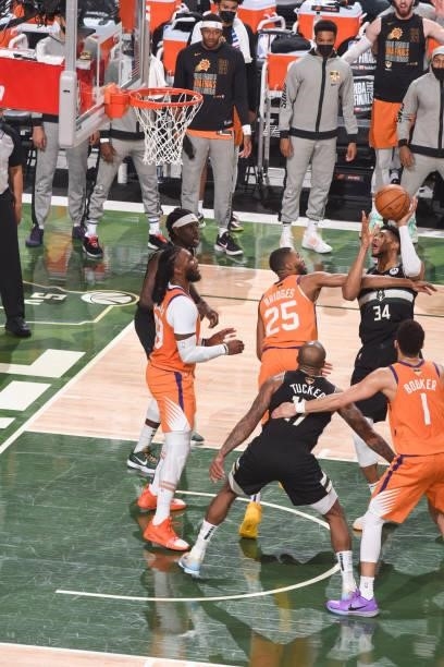 Giannis Antetokounmpo of the Milwaukee Bucks drives to the basket during the game against the Phoenix Suns during Game Six of the 2021 NBA Finals on...
