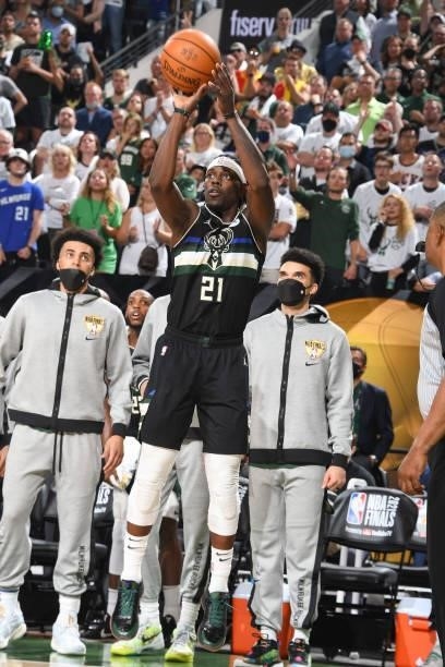 Jrue Holiday of the Milwaukee Bucks shoots a three point basket during the game against the Phoenix Suns during Game Six of the 2021 NBA Finals on...