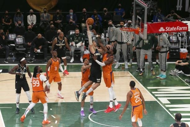 Brook Lopez of the Milwaukee Bucks dunks the ball against the Phoenix Suns during Game Six of the 2021 NBA Finals on July 20, 2021 at the Fiserv...