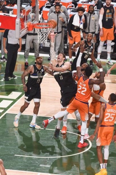 Brook Lopez of the Milwaukee Bucks drives to the basket during the game against the Phoenix Suns during Game Six of the 2021 NBA Finals on July 20,...