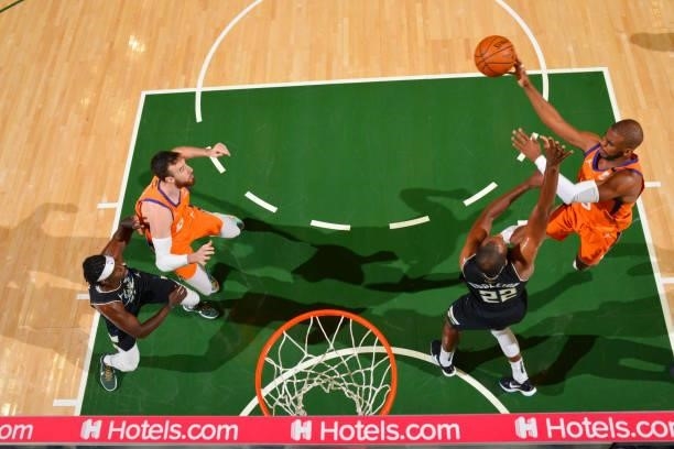 Chris Paul of the Phoenix Suns passes the ball against the Milwaukee Bucks during Game Six of the 2021 NBA Finals on July 20, 2021 at Fiserv Forum in...
