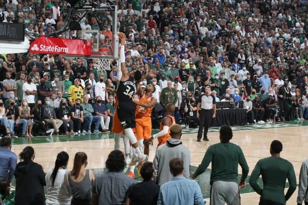 Giannis Antetokounmpo of the Milwaukee Bucks dunks the ball against the Phoenix Suns during Game Six of the 2021 NBA Finals on July 20, 2021 at the...