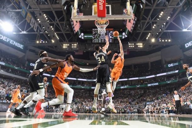 Giannis Antetokounmpo of the Milwaukee Bucks blocks Devin Booker of the Phoenix Suns during Game Six of the 2021 NBA Finals on July 20, 2021 at the...