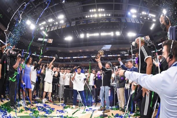 Owner Mark Edens of the Milwaukee Bucks holds the Larry O'Brien Trophy after defeating the Phoenix Suns in Game Six to win the 2021 NBA Finals on...