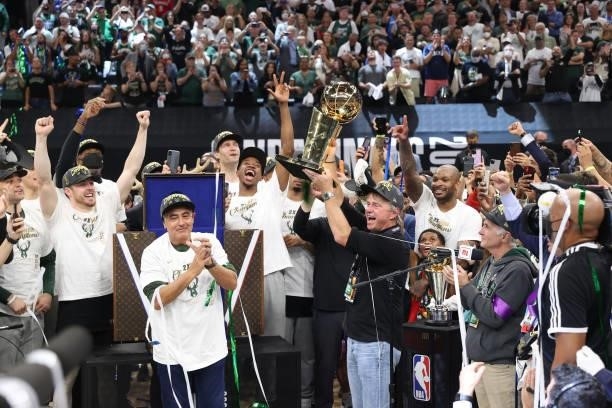 The Milwaukee Bucks are presented with the Larry O'Brien trophy after winning the 2021 NBA Finals on July 20, 2021 at Fiserv Forum in Milwaukee,...