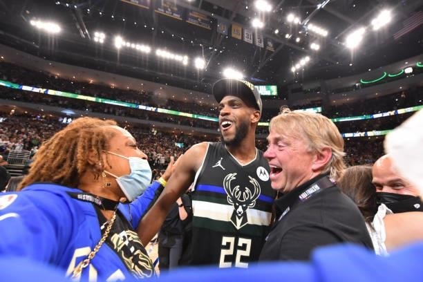 Khris Middleton of the Milwaukee Bucks and Milwaukee Bucks owner, Wes Edens react after winning Game Six of the 2021 NBA Finals against the Phoenix...