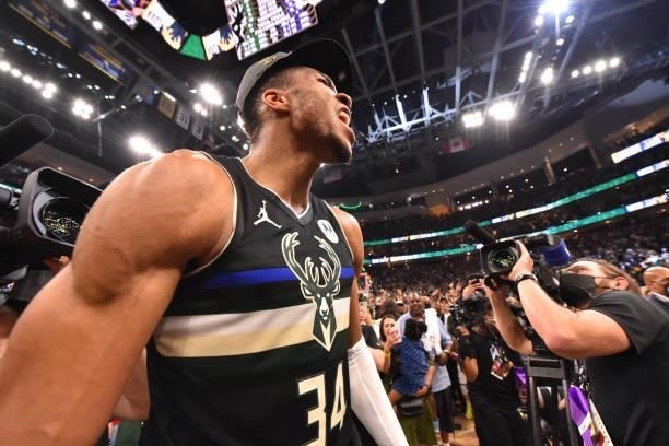 Giannis Antetokounmpo of the Milwaukee Bucks reacts after winning Game Six of the 2021 NBA Finals against the Phoenix Suns on July 20, 2021 at Fiserv...